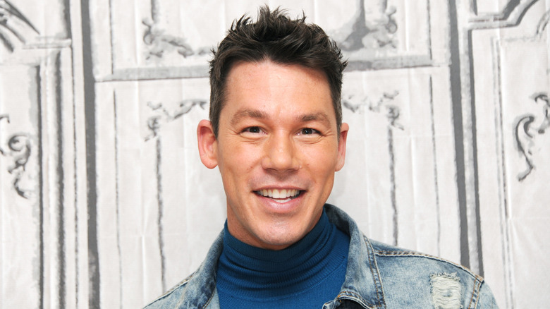 HGTV star David Bromstad smiling for the camera.