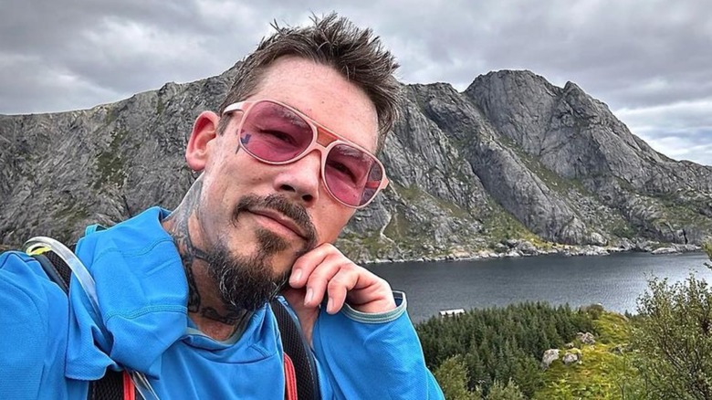 David Bromstad taking a selfie in front of a mountain