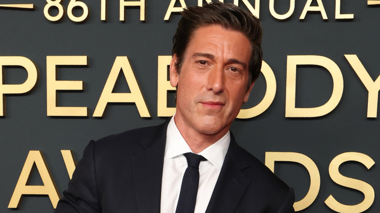 David Muir poses with Peabody Award in May 2026