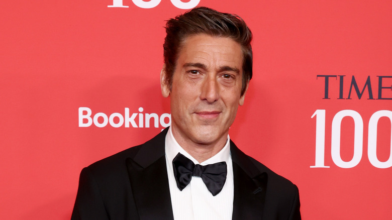 David Muir smiling and posing at a Time 100 event.