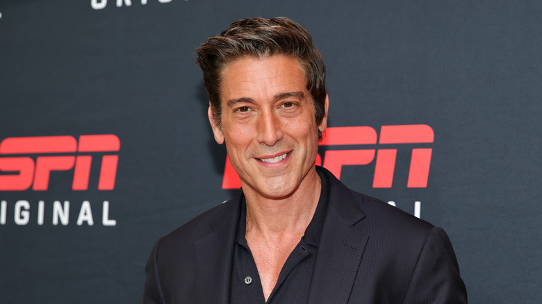 David Muir smiling at an ESPN event.