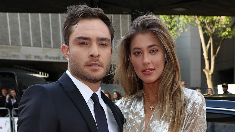 Ed Westwick, Jessica Serfaty posing outdoors