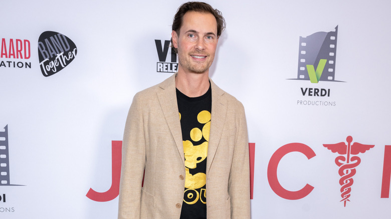 Erik von Detten posing at a premiere in 2024.