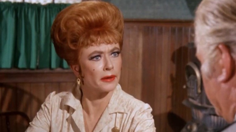Amanda Blake with her hair styled in a tall beehive in "Gunsmoke."