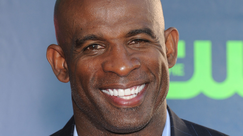 Deion Sanders smilng