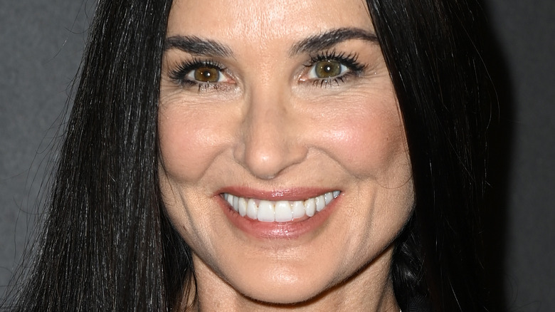 Demi Moore nude lip white teeth smiling