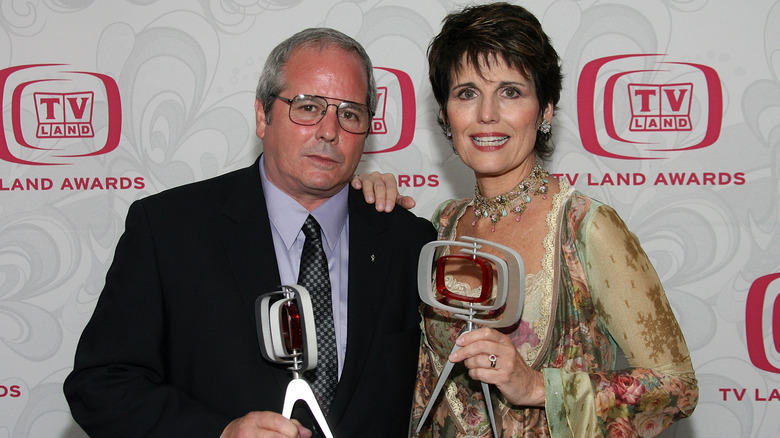 Desi Arnaz Jr. and Lucie Arnaz holding awards