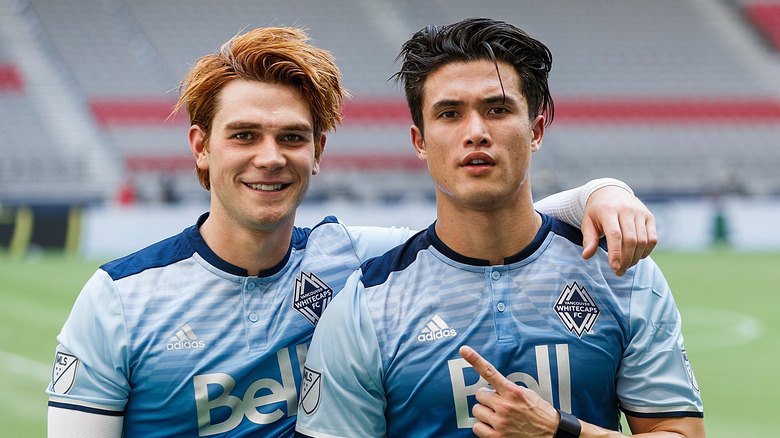 Charles Melton and KJ Apa at a soccer charity game