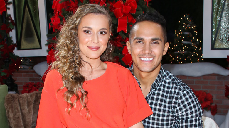 Alexa and Carlos PenaVega smiling