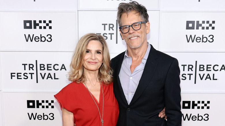 Kyra Sedgwick and Kevin Bacon posing