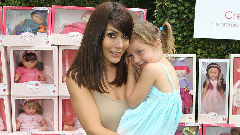 Marisol Nichols holding daughter Rain India