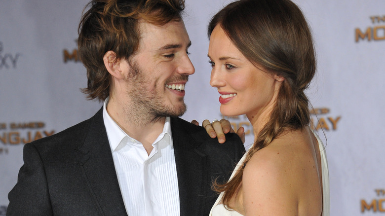 Sam Claflin and Laura Haddock smiling