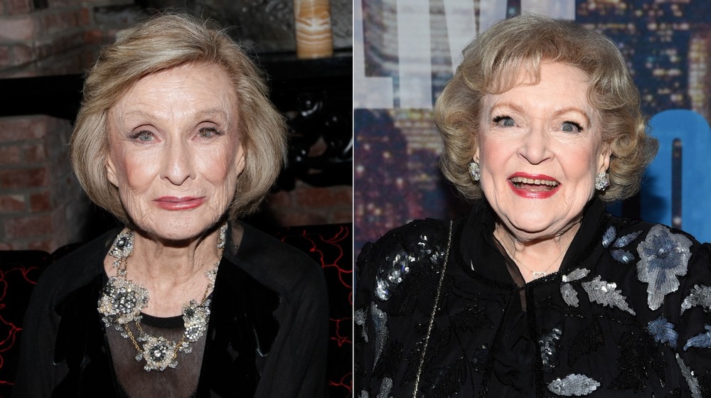 Cloris Leachman (right) smiles for the camera at an event as Betty White does the same on the left