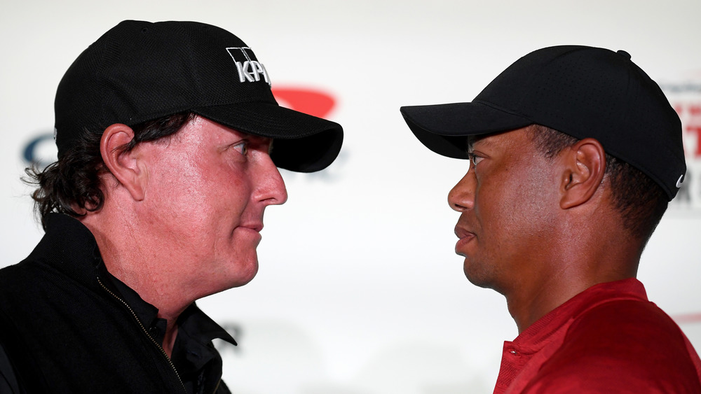 Phil Mickelson and Tiger Woods face off