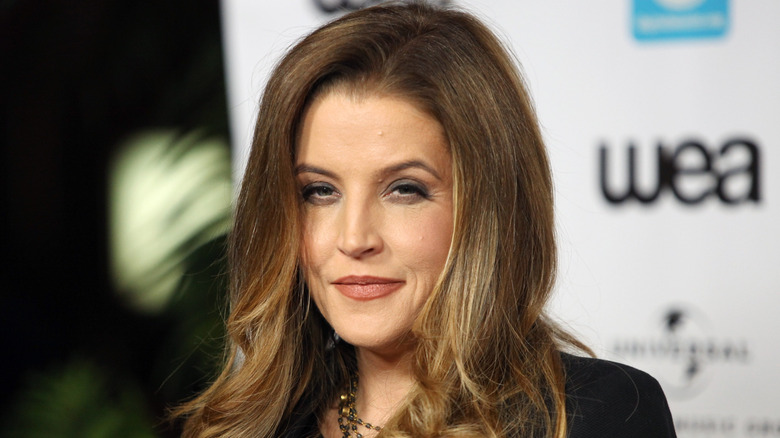 Lisa Marie Presley red lipstick