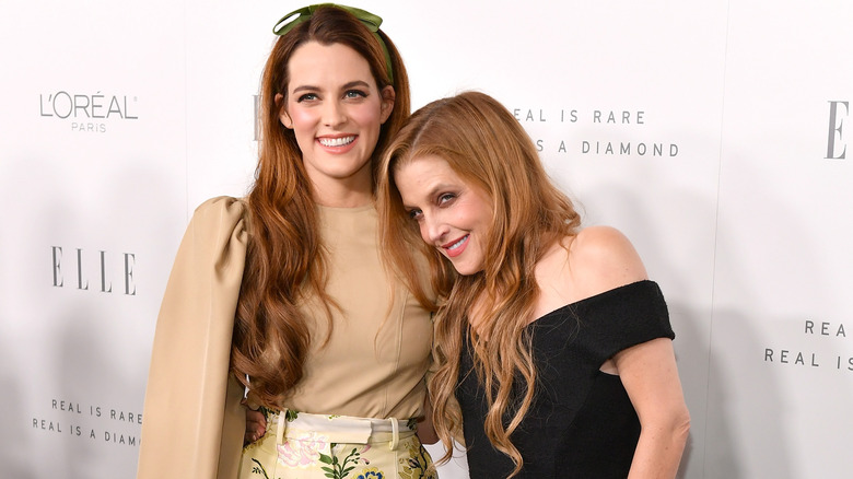 Riley Keough hugging Lisa Marie Presley