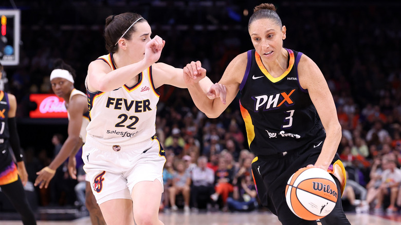 Diana Taurasi and Caitlin Clark on the court
