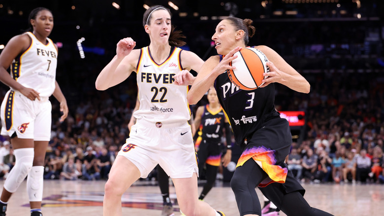Caitlin Clark and Diana Taurasi during a game