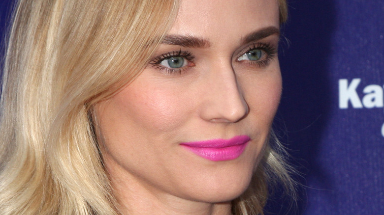 Diane Kruger poses with pink lipstick in 2014