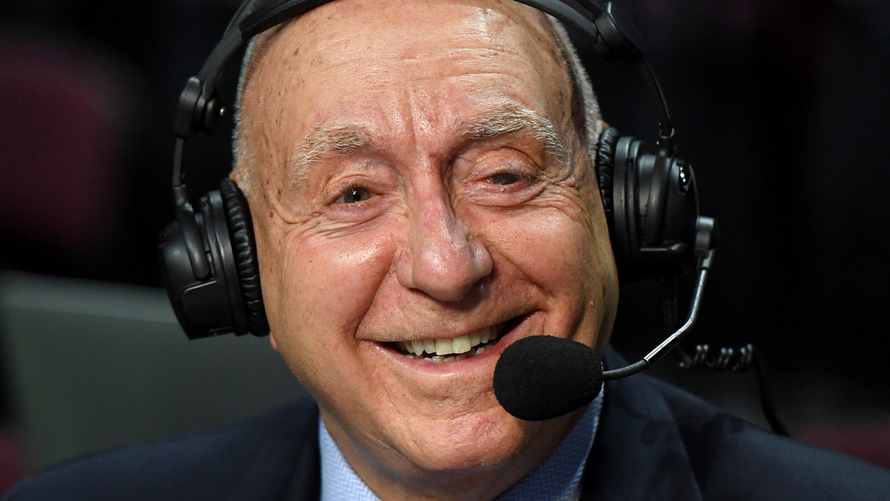 ESPN announcer Dick Vitale smiling, wearing a broadcasting headset