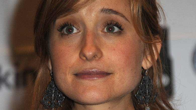 Allison Mack posing