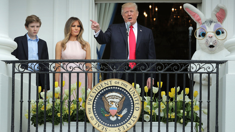 Barron Trump next to his parents at the White House