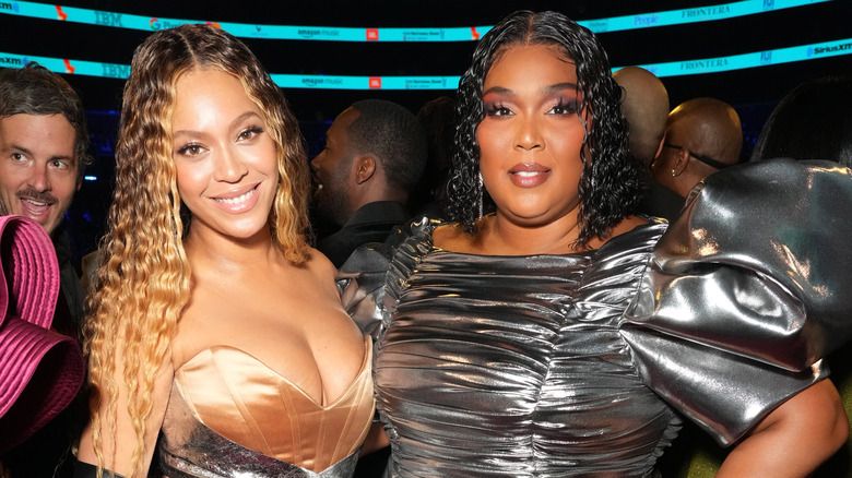 Beyoncé and Lizzo posing