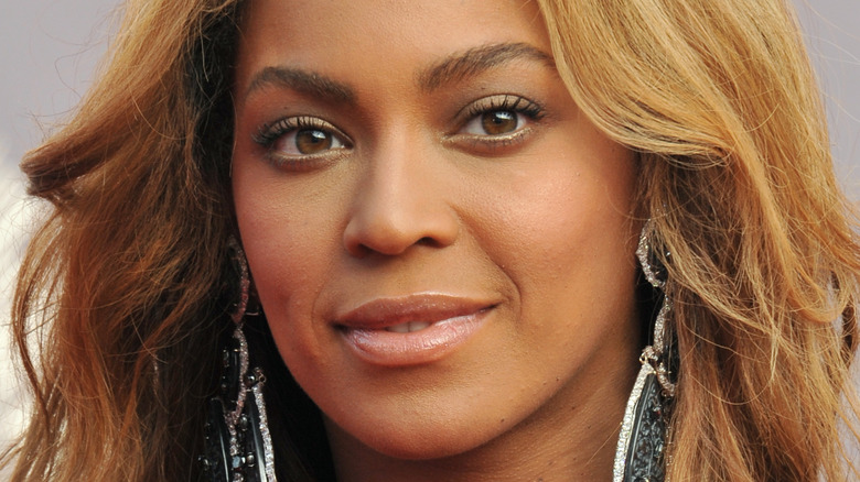 Beyonce with a slight smile