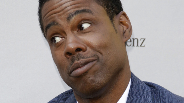 Chris Rock tilting head