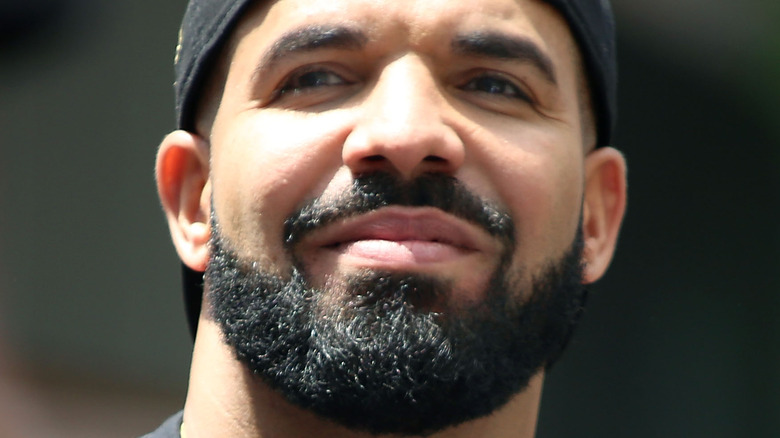 Drake with a neutral expression