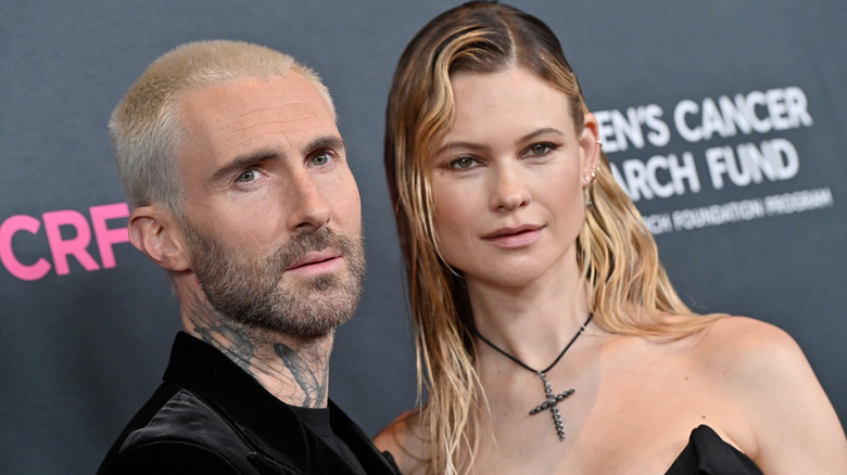 Adam Levine and Behati Prinsloo smiling