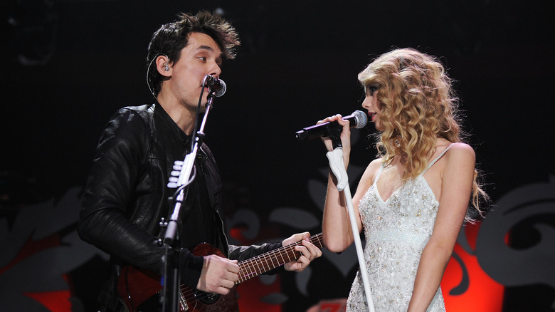 John Mayer and Taylor Swift performing