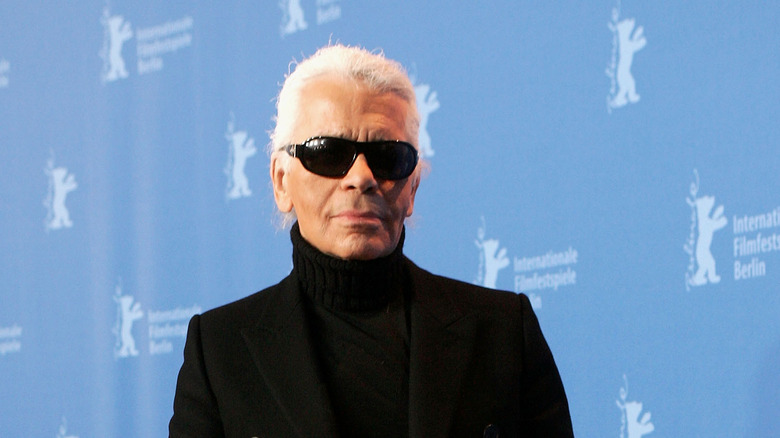 Karl Lagerfeld posing