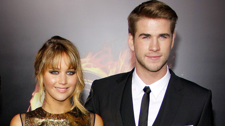 Jennifer Lawrence and Liam Hemsworth smiling