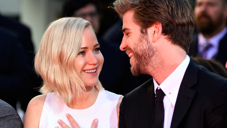 Jennifer Lawrence and Liam Hemsworth talking
