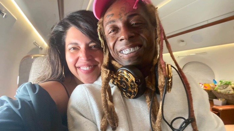 Denise Bidot smiles alongside Lil Wayne in selfie