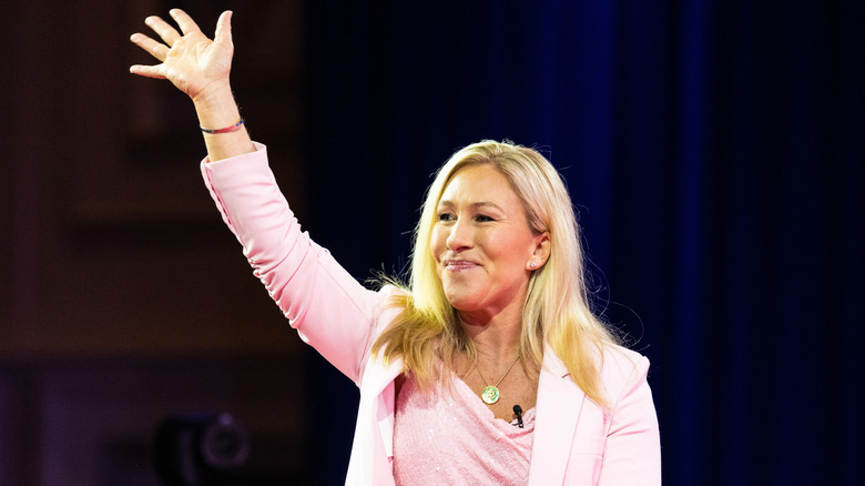 Marjorie Taylor Greene smiling and waving