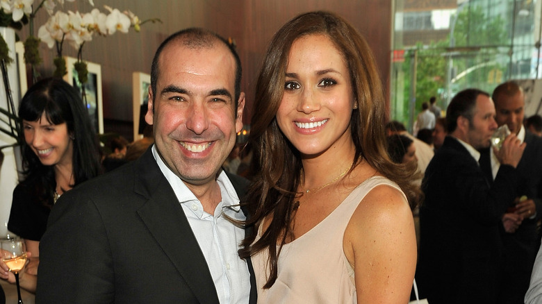 Rick Hoffman and Meghan Markle posing