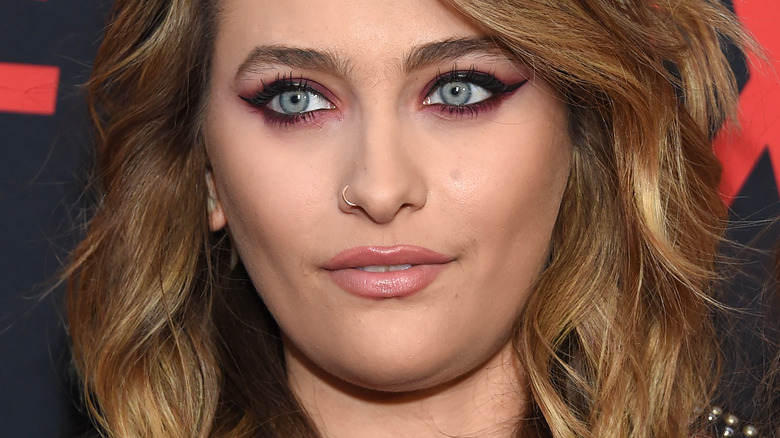 Paris Jackson with slight smile on red carpet 