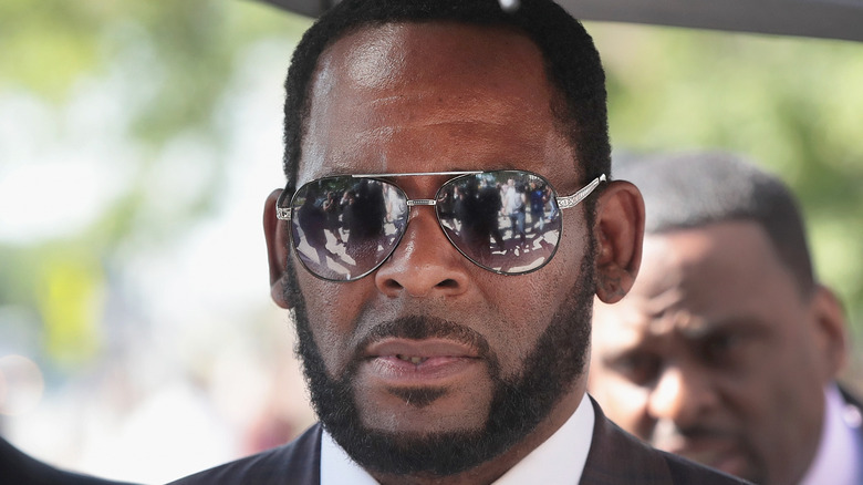 R. Kelly wearing sunglasses