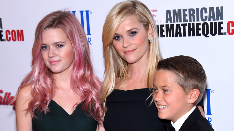 Reese Witherspoon posing with her kids