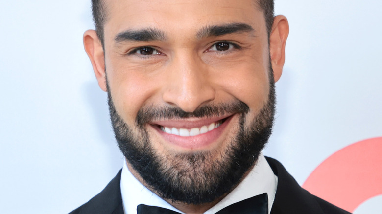 Sam Asghari smiling