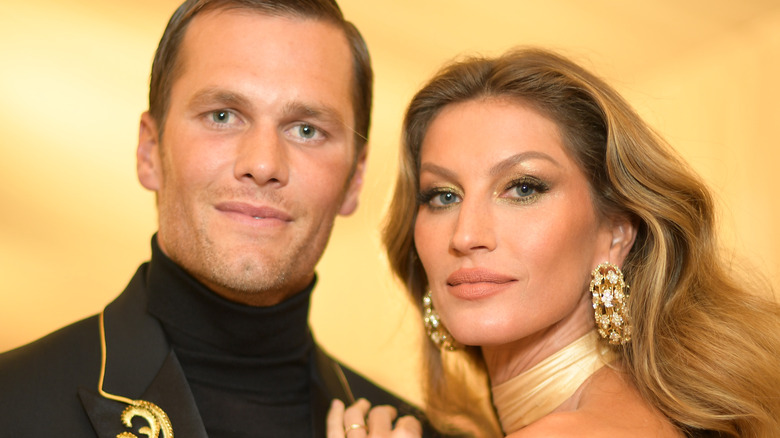 Gisele Bündchen and Tom Brady pose for cameras