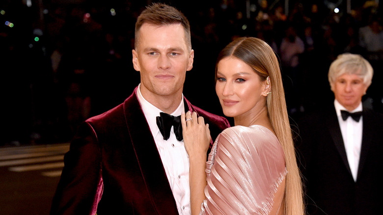 Tom Brady posing with Gisele Bündchen