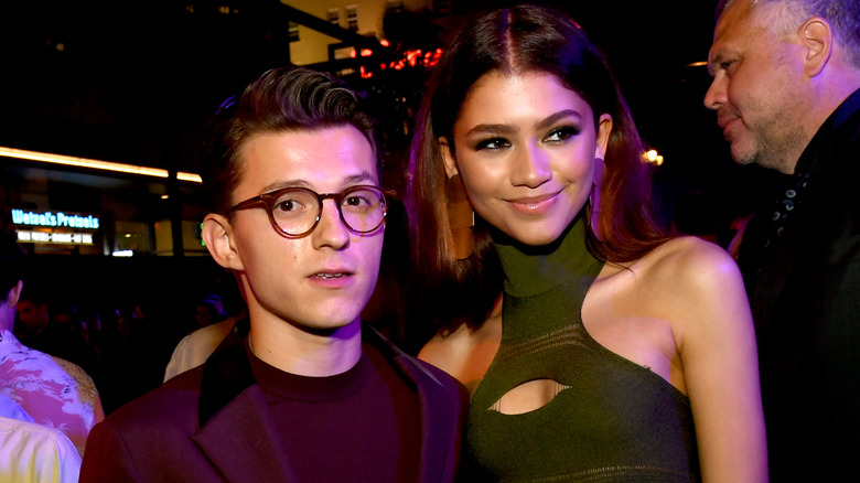 Tom Holland and Zendaya pose for cameras