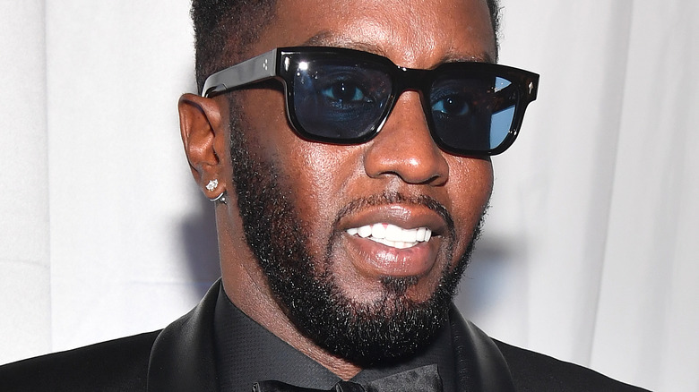 Diddy smiling in sunglasses