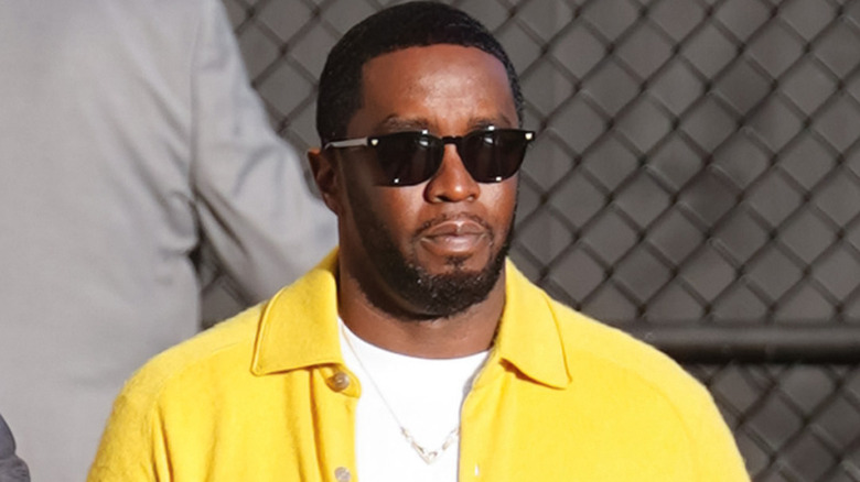 Sean "Diddy"Combs walking with sunglasses on