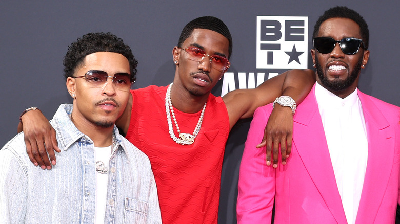 Sean "Diddy" Combs posing with sons
