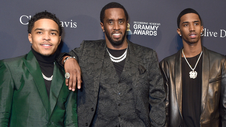 Sean "Diddy" Combs posing with sons
