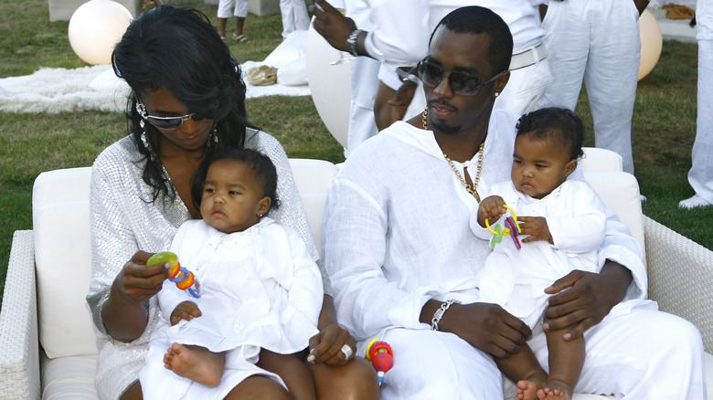 Kim Porter and Diddy with twins